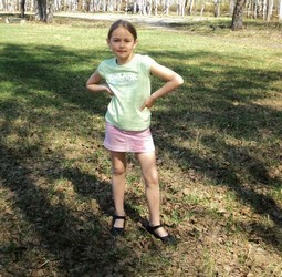 small girl in shorts