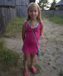 small girl in shorts