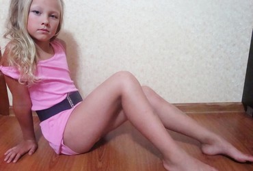 small girl in shorts