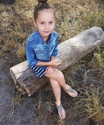 small girl in shorts