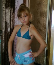 small girl in shorts