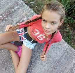 small girl in shorts