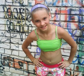 small girl in shorts