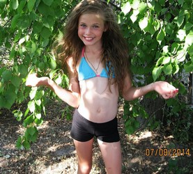 small girl in shorts