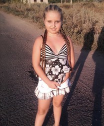 small girl in shorts